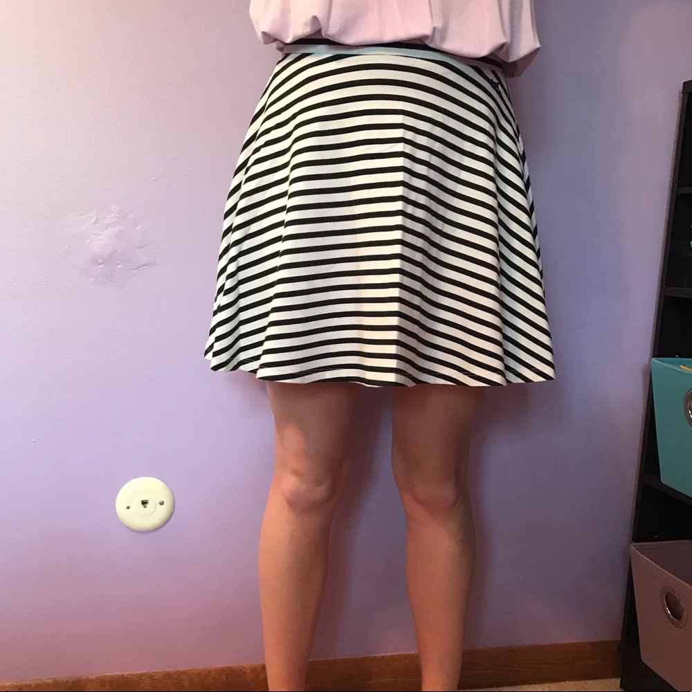 Black and white striped skirt.